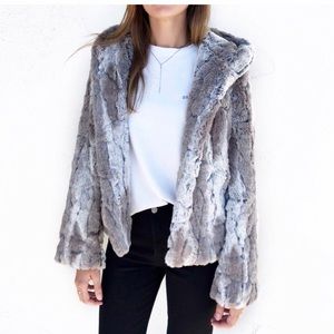 Faux fur hooded coat.